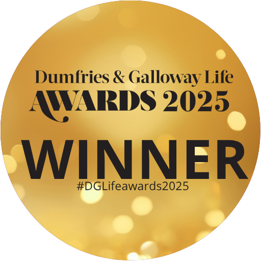 Gold circular badge with 'Dumfries & Galloway Life Awards 2025 Winner' text on a white background