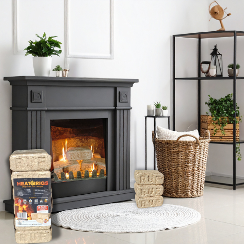 Gray electric fireplace with decorative items in a room with a white wall and black shelving unit.